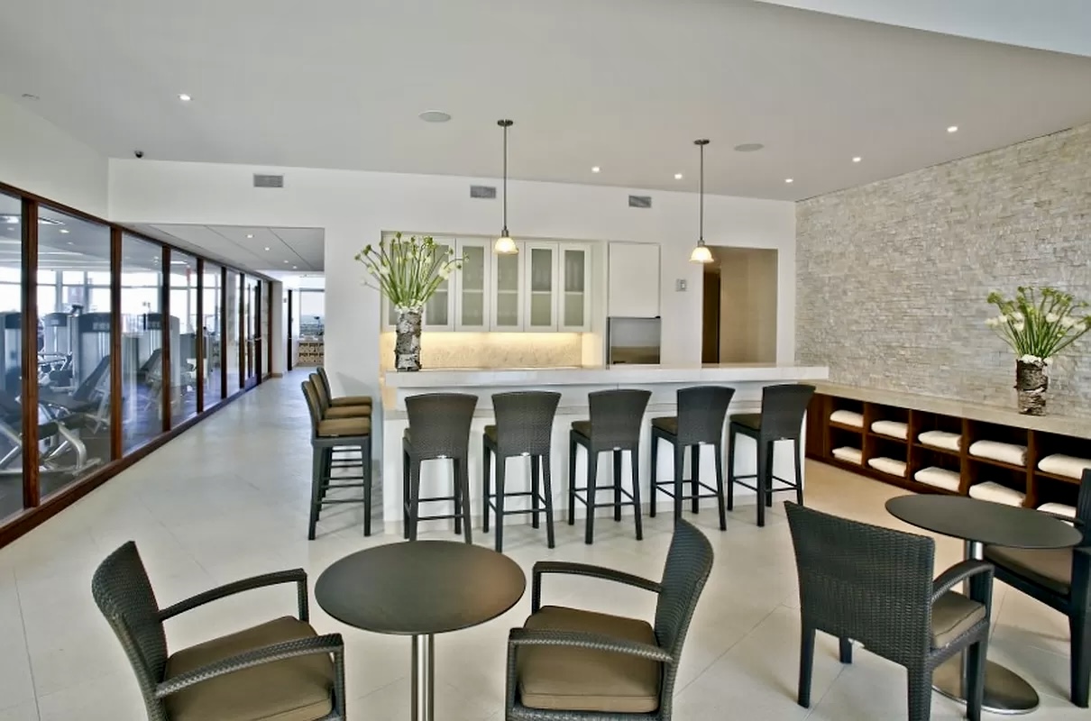 30 West 63rd Street, Unit 7O Manhattan, NY 10023 - Photo 7 of 16 a dining room with furniture a rug and wooden floor