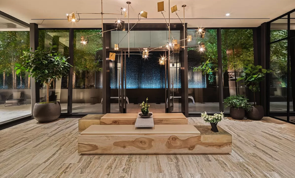 111 Murray Street, Unit 16B Manhattan, NY 10007 - Photo 12 of 22 a view of a patio with table and chairs potted plants with wooden floor
