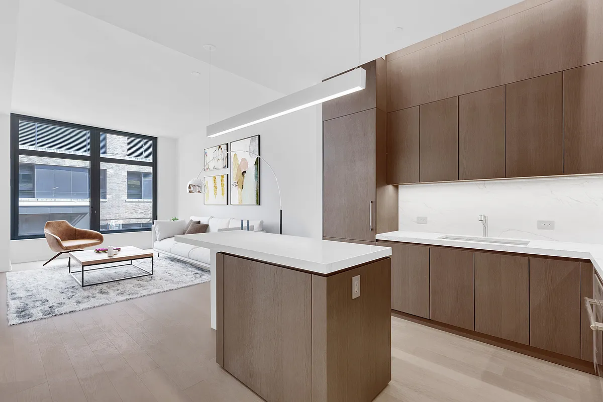 77 Charlton Street, Unit N7D Manhattan, NY 10014 - Photo 3 of 14 a kitchen with a sink and cabinets