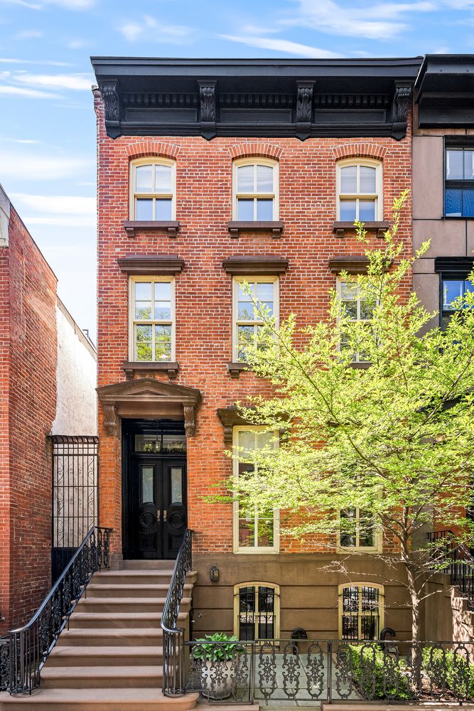 a front view of a building with many windows