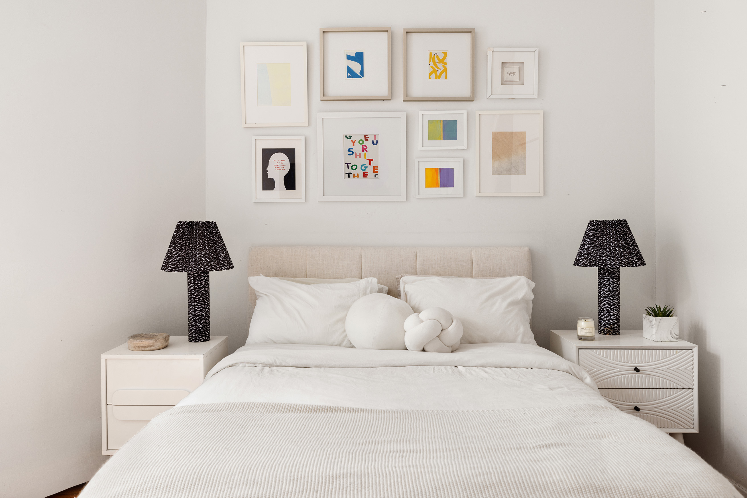 2 Cornelia Street, Unit 201 Manhattan, NY 10014 - Photo 6 of 11 a bedroom with a bed and a lamp