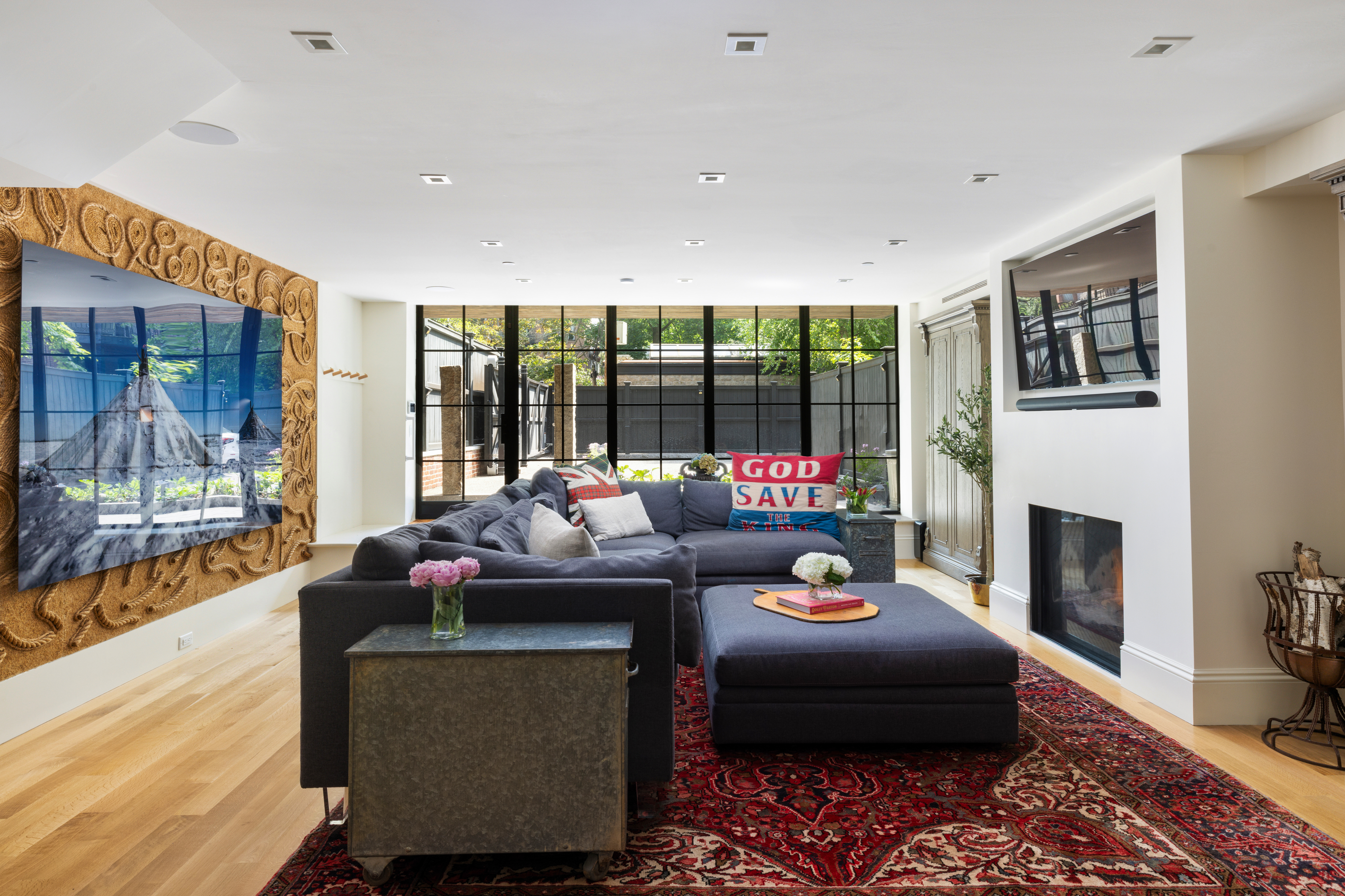 South End Boston, MA 02118 - Photo 19 of 24 a living room with furniture and a fireplace