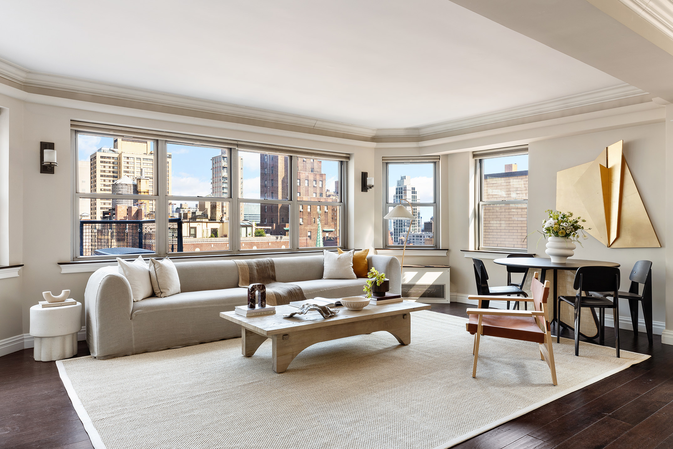 80 Park Avenue, Unit 19N Manhattan, NY 10016 - Photo 7 of 20 a living room with furniture and a large window