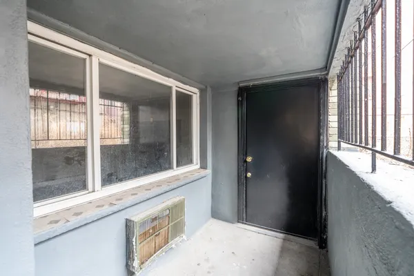 a view of a bathroom with a sink and window