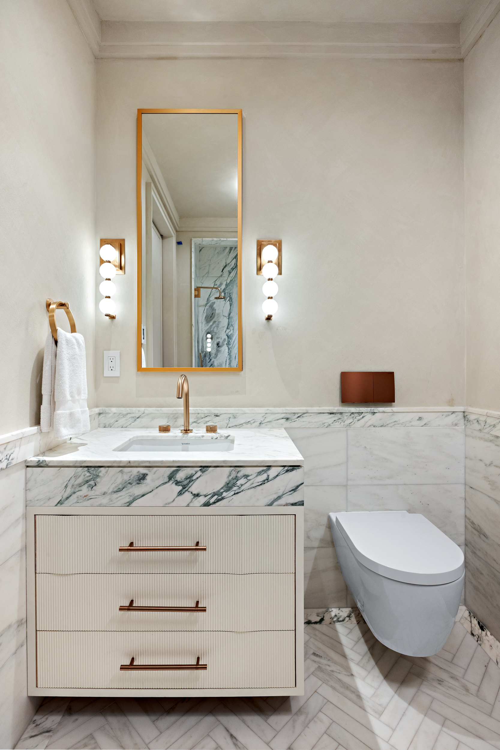 30 Front Street, Unit 25A Brooklyn, NY 11201 - Photo 23 of 45 a bathroom with a granite countertop toilet sink and mirror