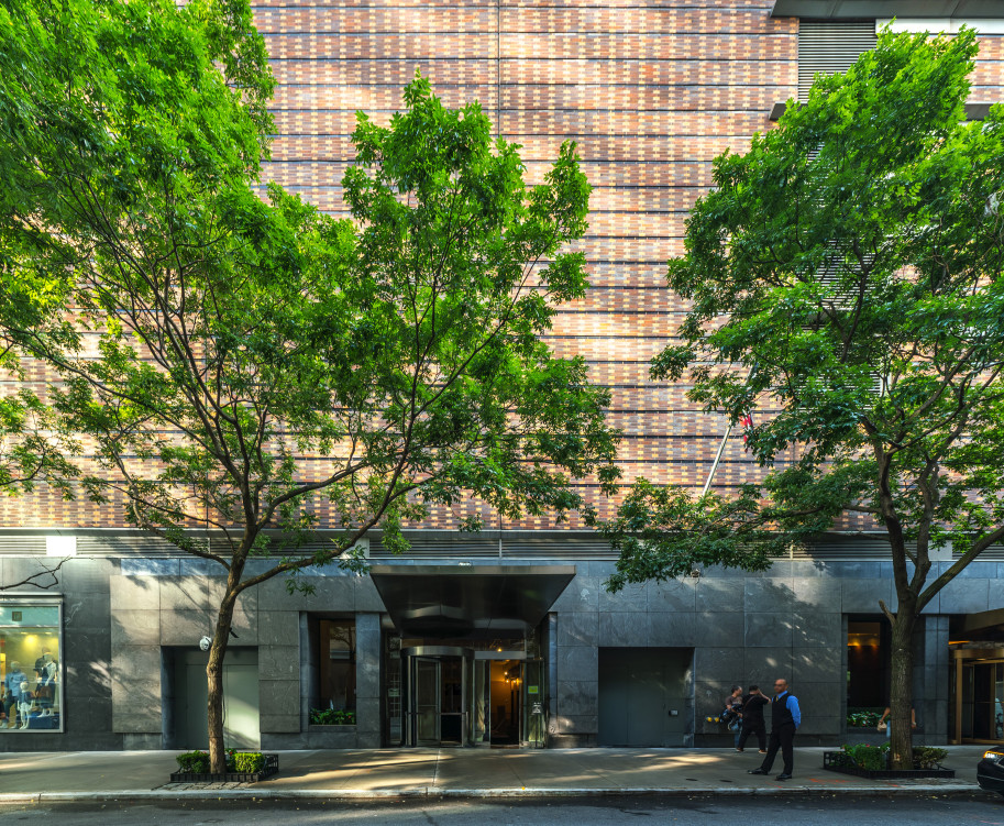 111 West 67th Street, Unit 24L Manhattan, NY 10023 - Photo 5 of 10 a front view of a building with street view