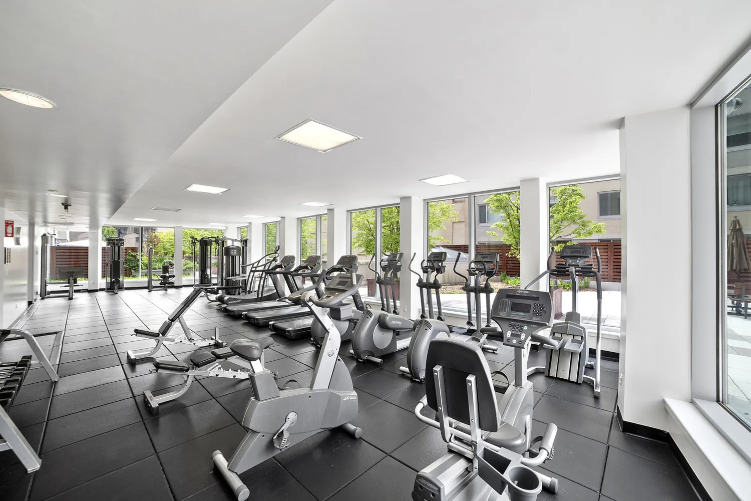 a very nice looking living room with furniture and a large window