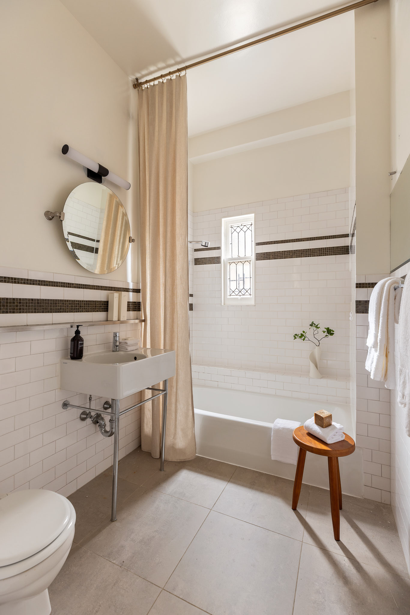 530 West End Avenue, Unit 81 Manhattan, NY 10024 - Photo 10 of 18 a bathroom with a shower a toilet and a sink