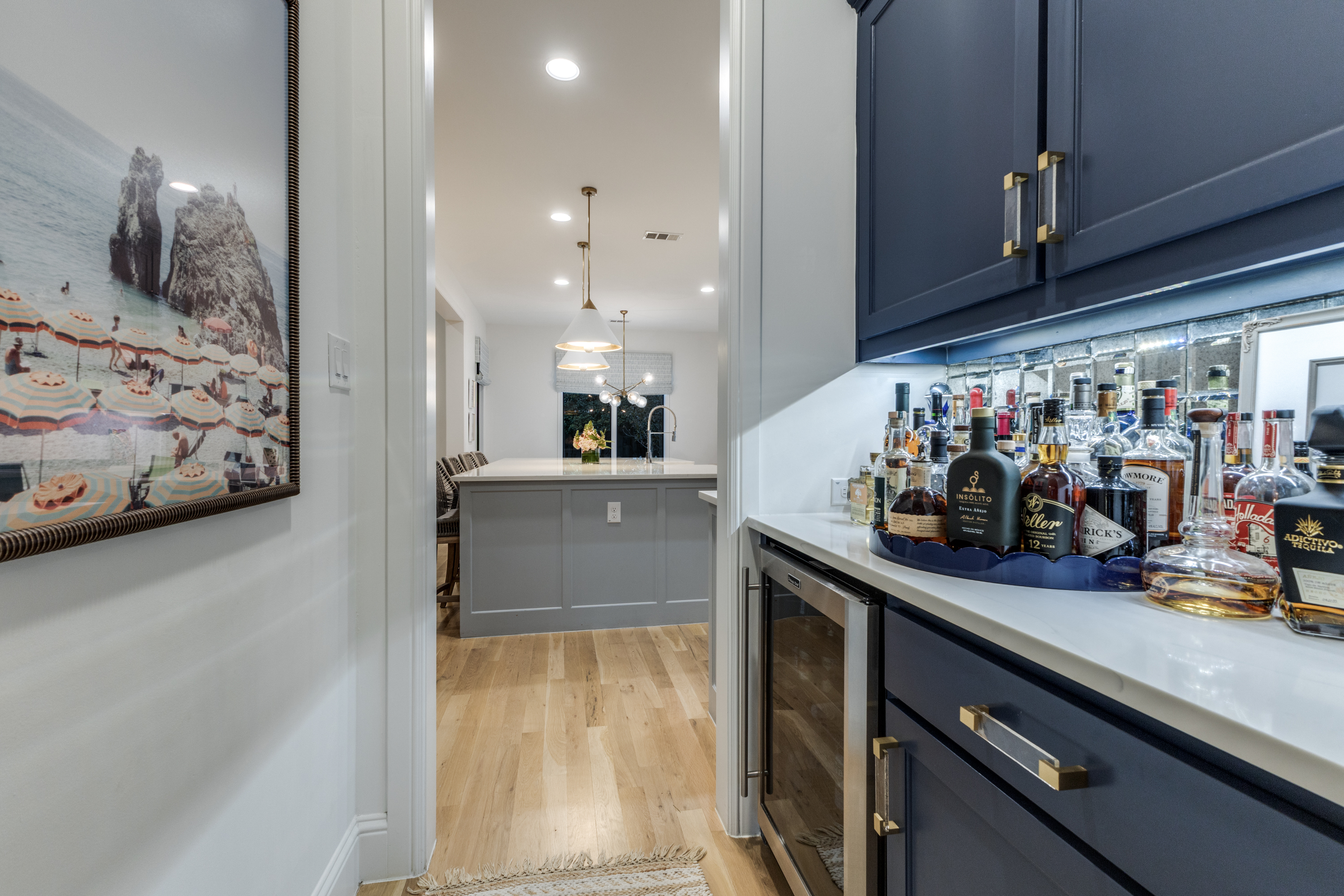 4042 Dunhaven Road Dallas, TX 75220 - Photo 16 of 34 a view of a kitchen with kitchen island and stainless steel appliances