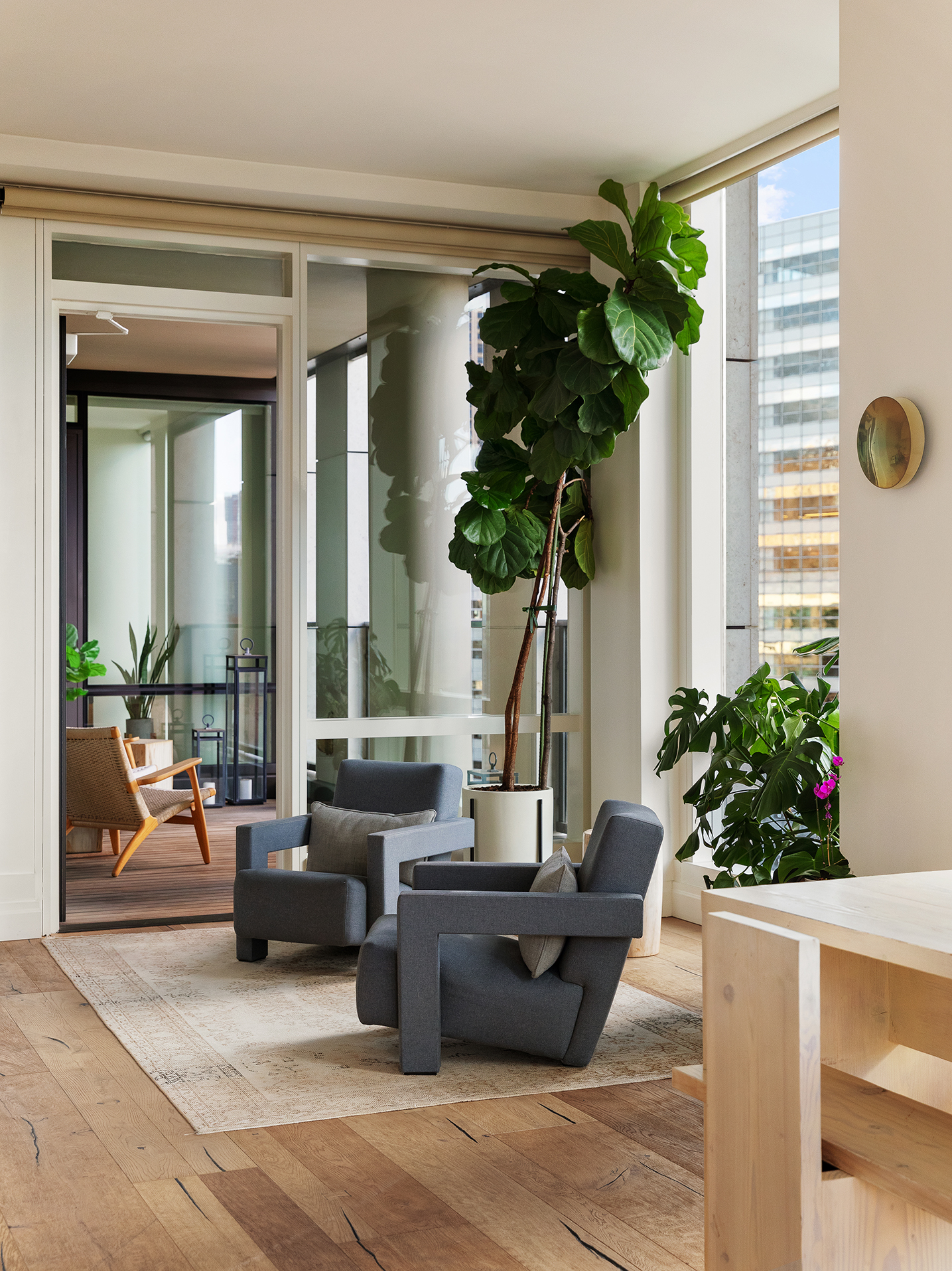 101 Warren Street, Unit 2010 Manhattan, NY 10007 - Photo 5 of 18 a living room with furniture potted plant and a window