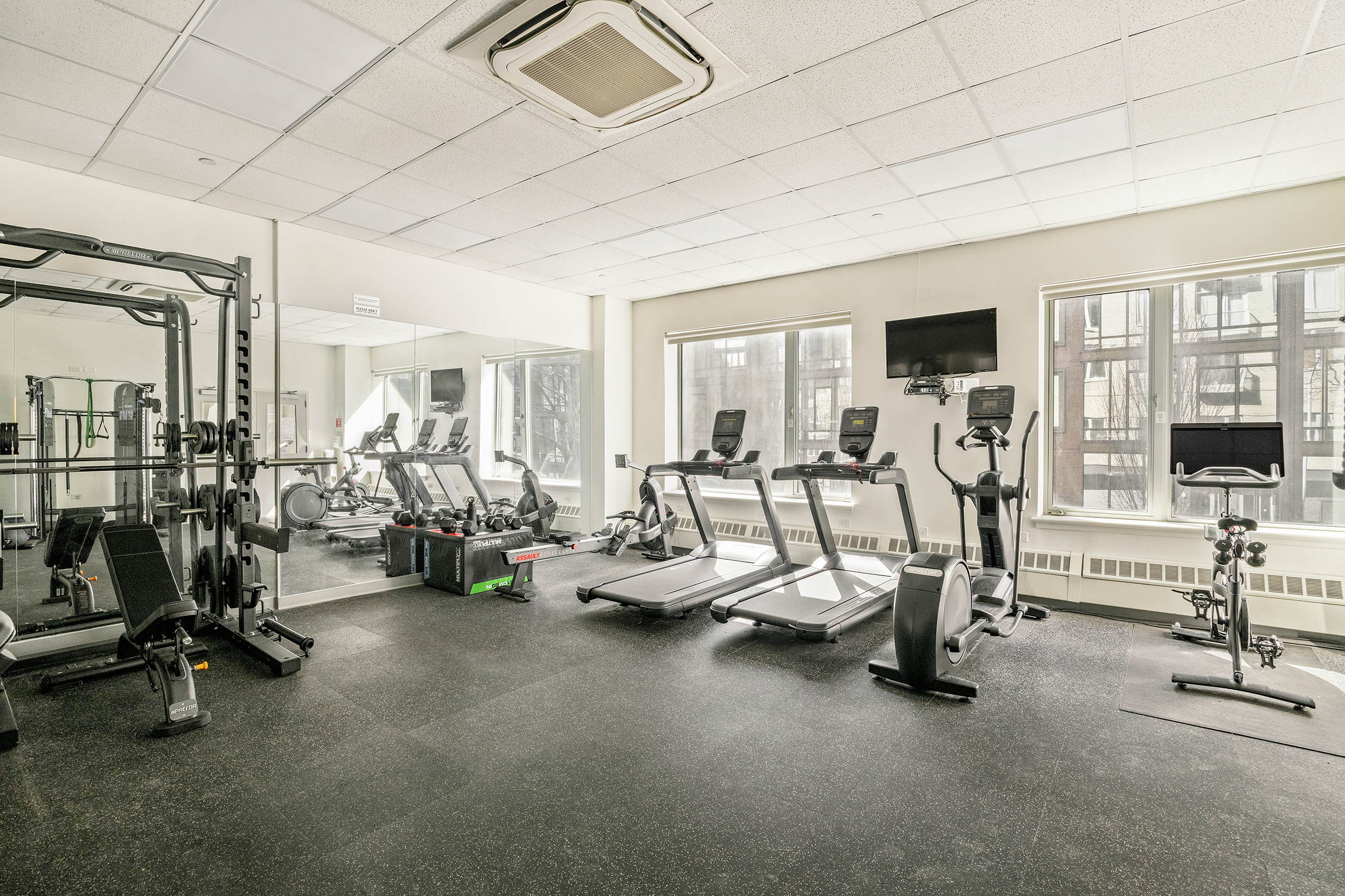 26 Broadway, Unit 704 Brooklyn, NY 11249 - Photo 14 of 20 a view of a room with gym equipment