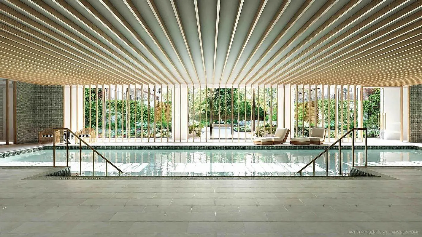 438 East 12th Street, Unit 6F Manhattan, NY 10009 - Photo 16 of 27 a living room with a large pool table and chairs next to a large window