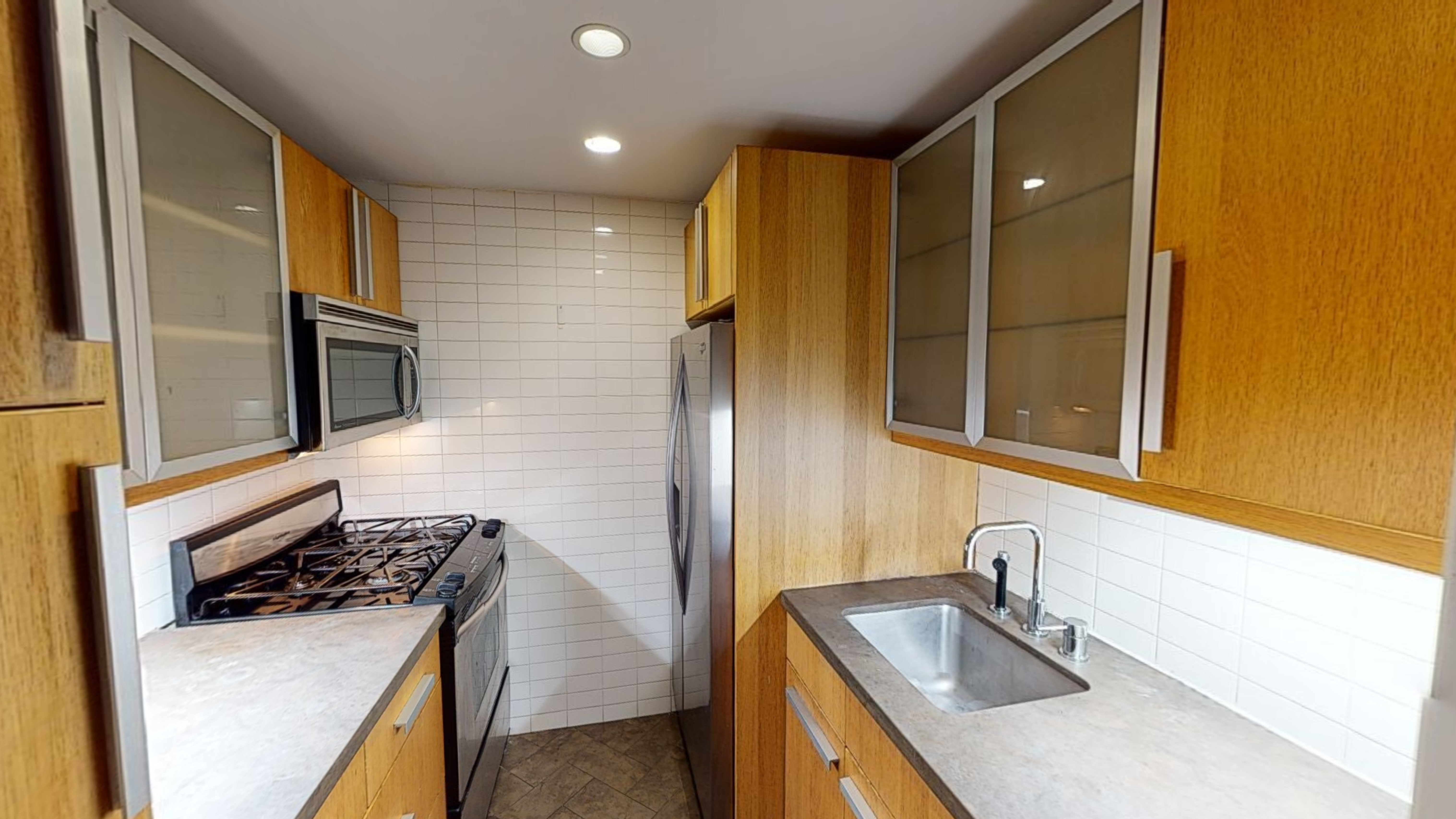 50 Lexington Avenue, Unit 4H Manhattan, NY 10010 - Photo 3 of 13 a bathroom with a sink double vanity and a shower