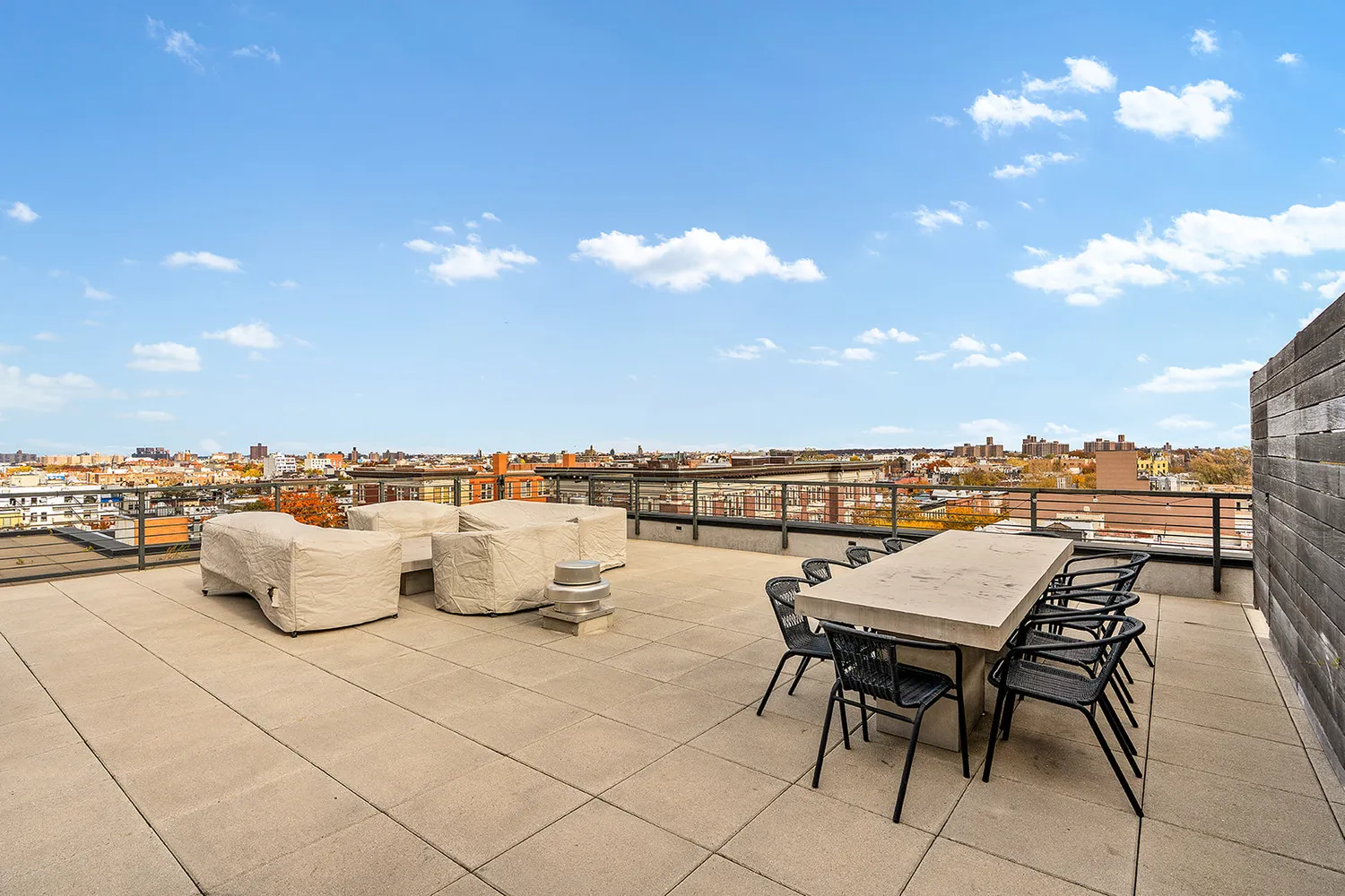 a view of a terrace with furniture and a terrace view