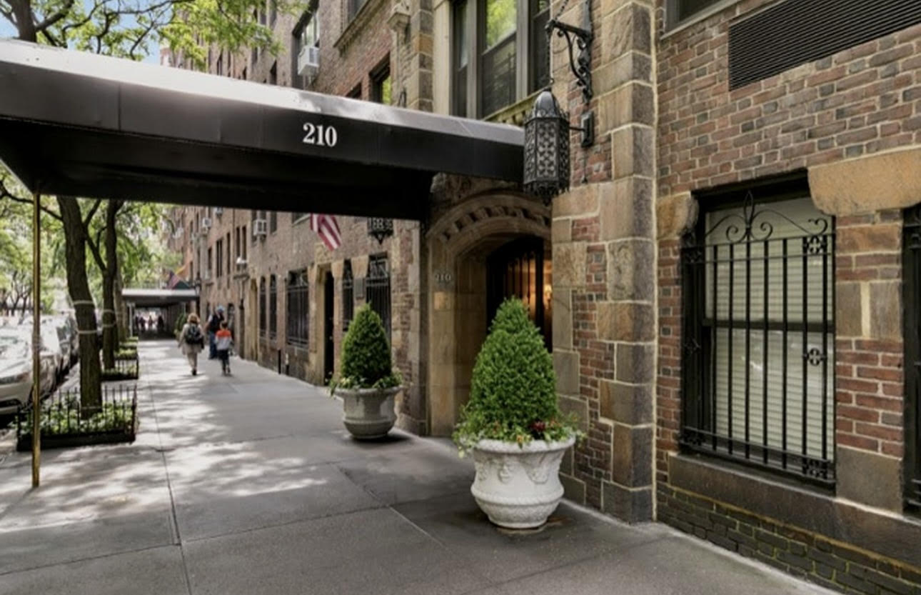 210 East 73rd Street, Unit 9EF Manhattan, NY 10021 - Photo 12 of 16 a view of a patio with table and chairs and potted plants
