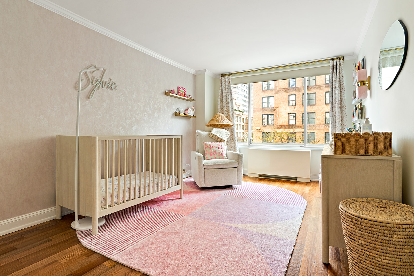 1160 3rd Avenue, Unit 4EF Manhattan, NY 10065 - Photo 7 of 11 a bedroom with furniture and a large window