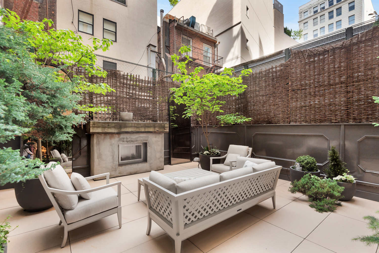 17 East 12th Street, Unit 2 Manhattan, NY 10003 - Photo 12 of 19 a view of a patio with couches and potted plants