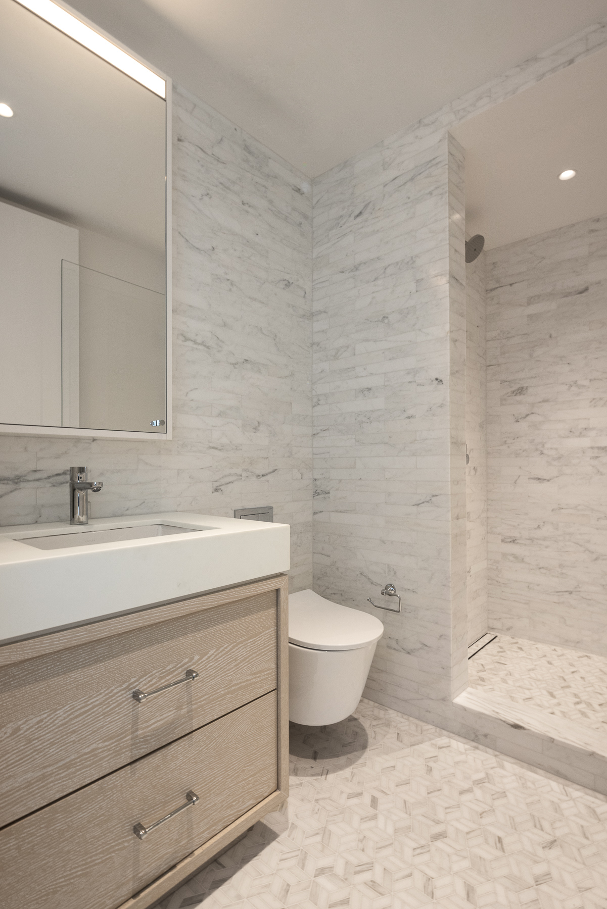 250 West 96th Street, Unit 22C Manhattan, NY 10025 - Photo 11 of 28 a bathroom with a toilet sink and mirror