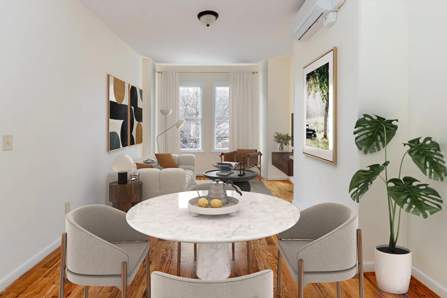 a view of a dining room with furniture and window