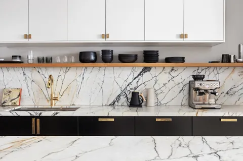 a black and white photo of a living room