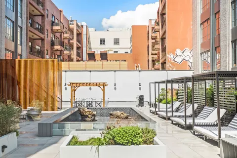 a view of building with outdoor seating