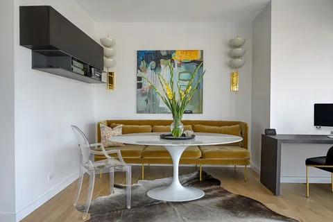 a view of a dining room with furniture