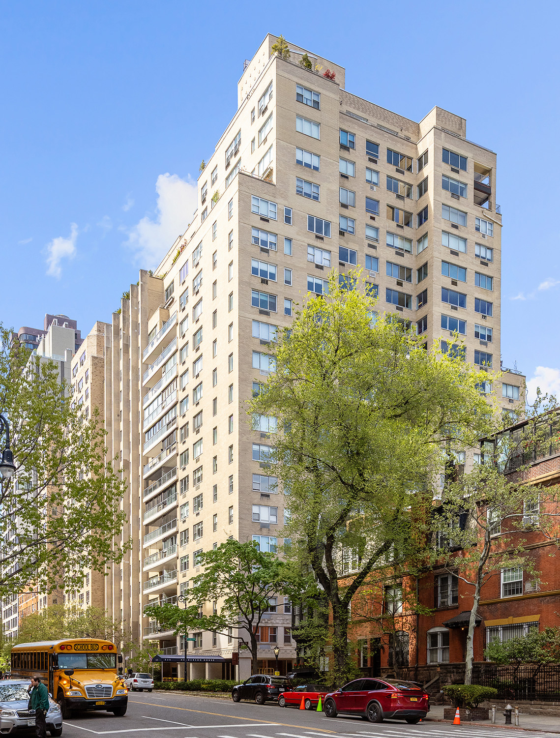 535 East 86th Street, Unit 16F Manhattan, NY 10028 - Photo 14 of 19 a view of a building and car parked on the roadside