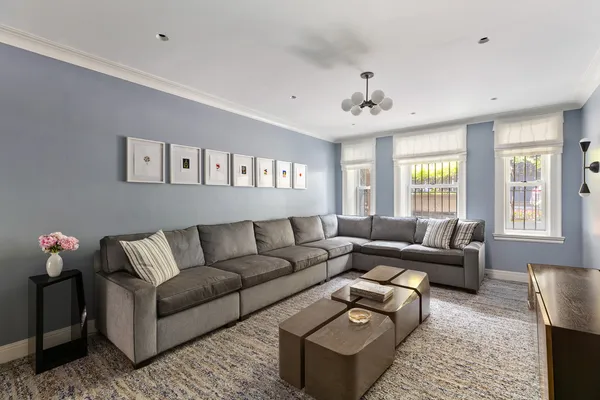a bathroom with a toilet and a mirror