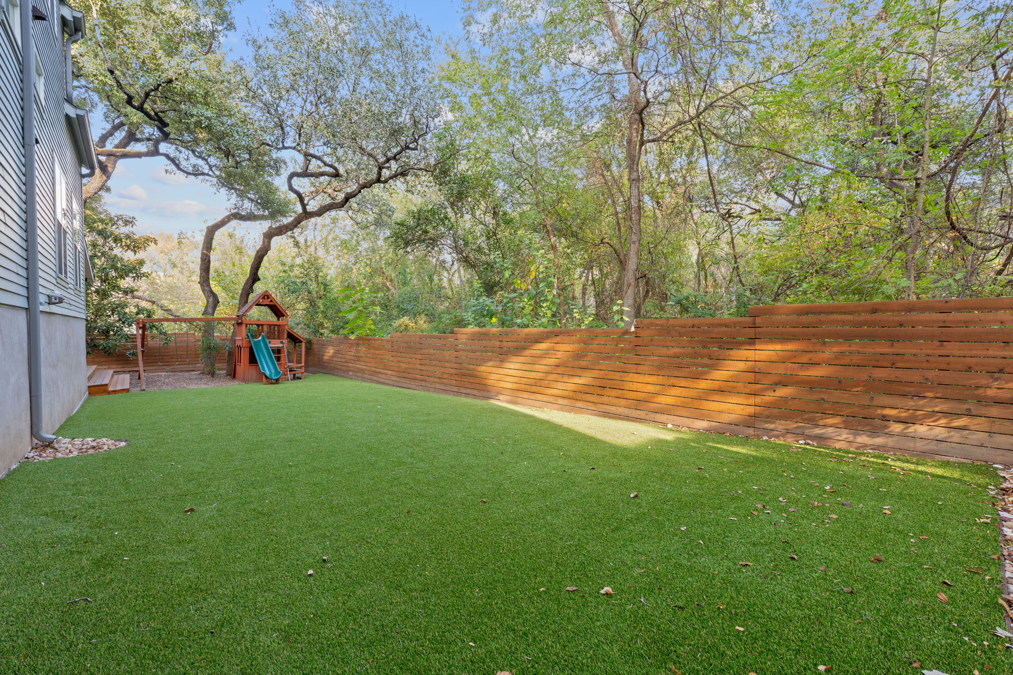 3001 Del Curto Road, Unit 10 Austin, TX 78704 - Photo 31 of 44 a view of outdoor space with playground and green space
