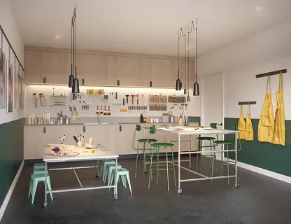 a room with stainless steel appliances kitchen island granite countertop furniture and a kitchen view