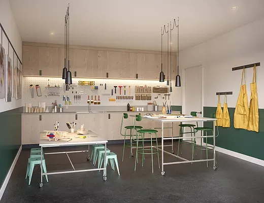 a room with stainless steel appliances kitchen island granite countertop furniture and a kitchen view