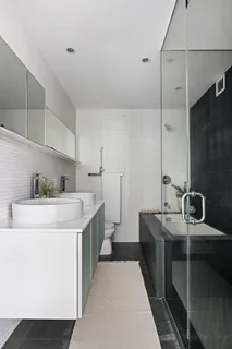 a view of a kitchen with electric appliances