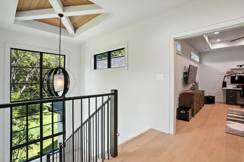 a bathroom with a sink a mirror and toilet
