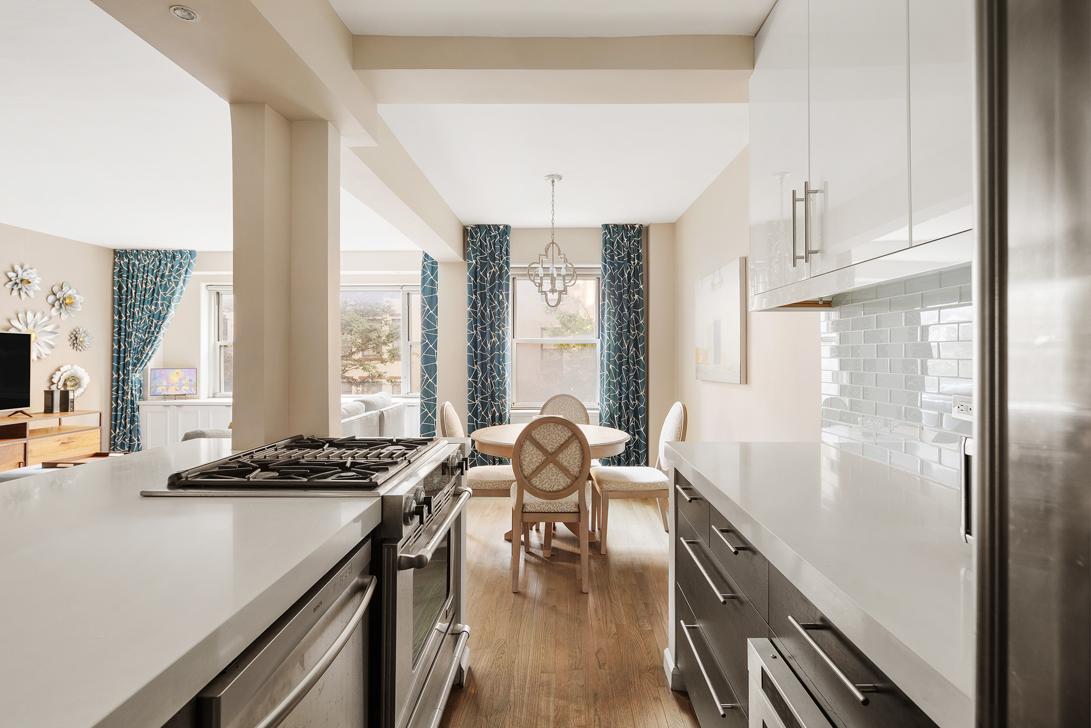 11 5th Avenue, Unit 3E Manhattan, NY 10003 - Photo 3 of 6 a dining room with furniture and window