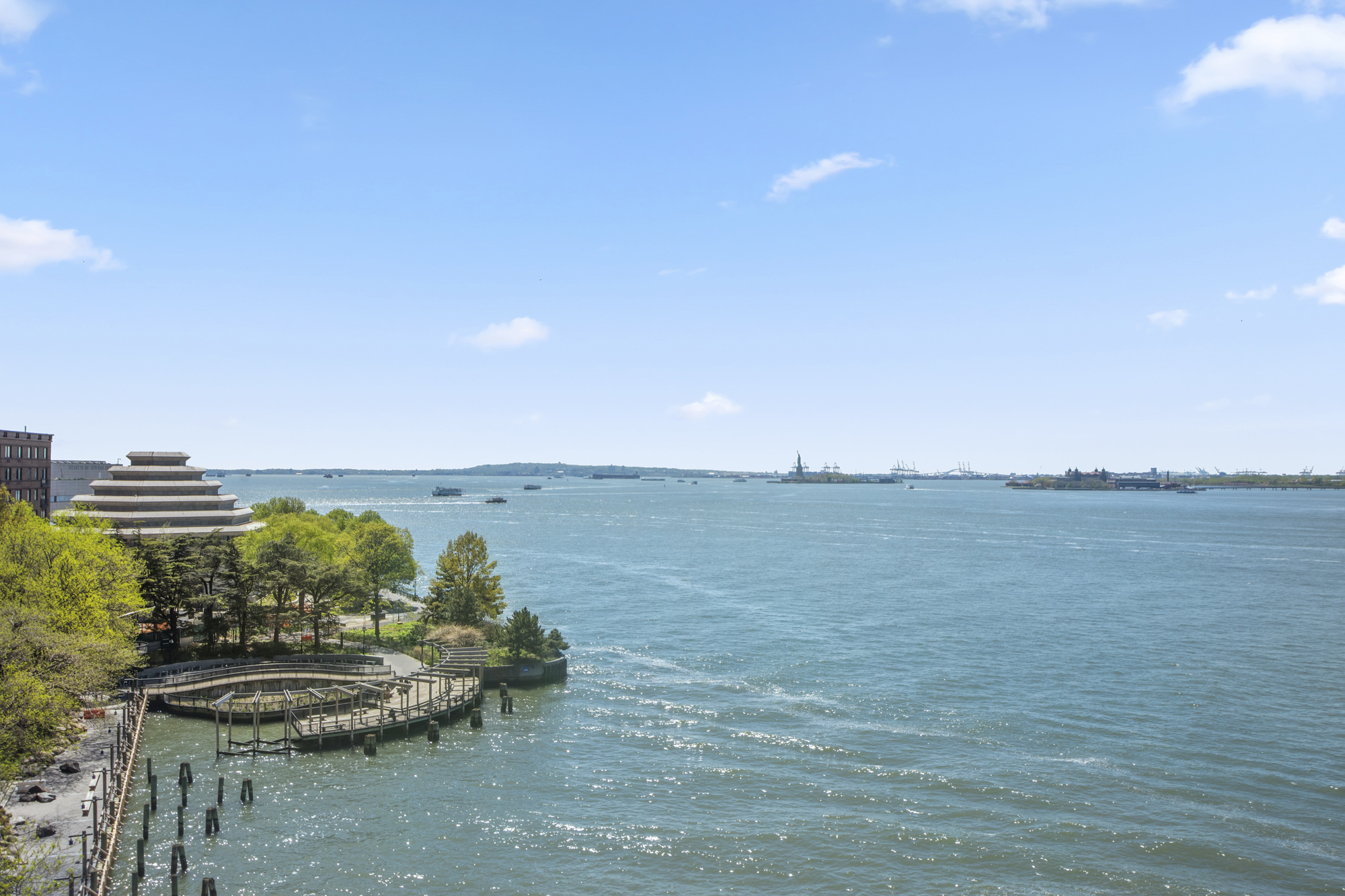 21 South End Avenue, Unit PH1A Manhattan, NY 10280 - Photo 24 of 32 a view of a lake from a yard