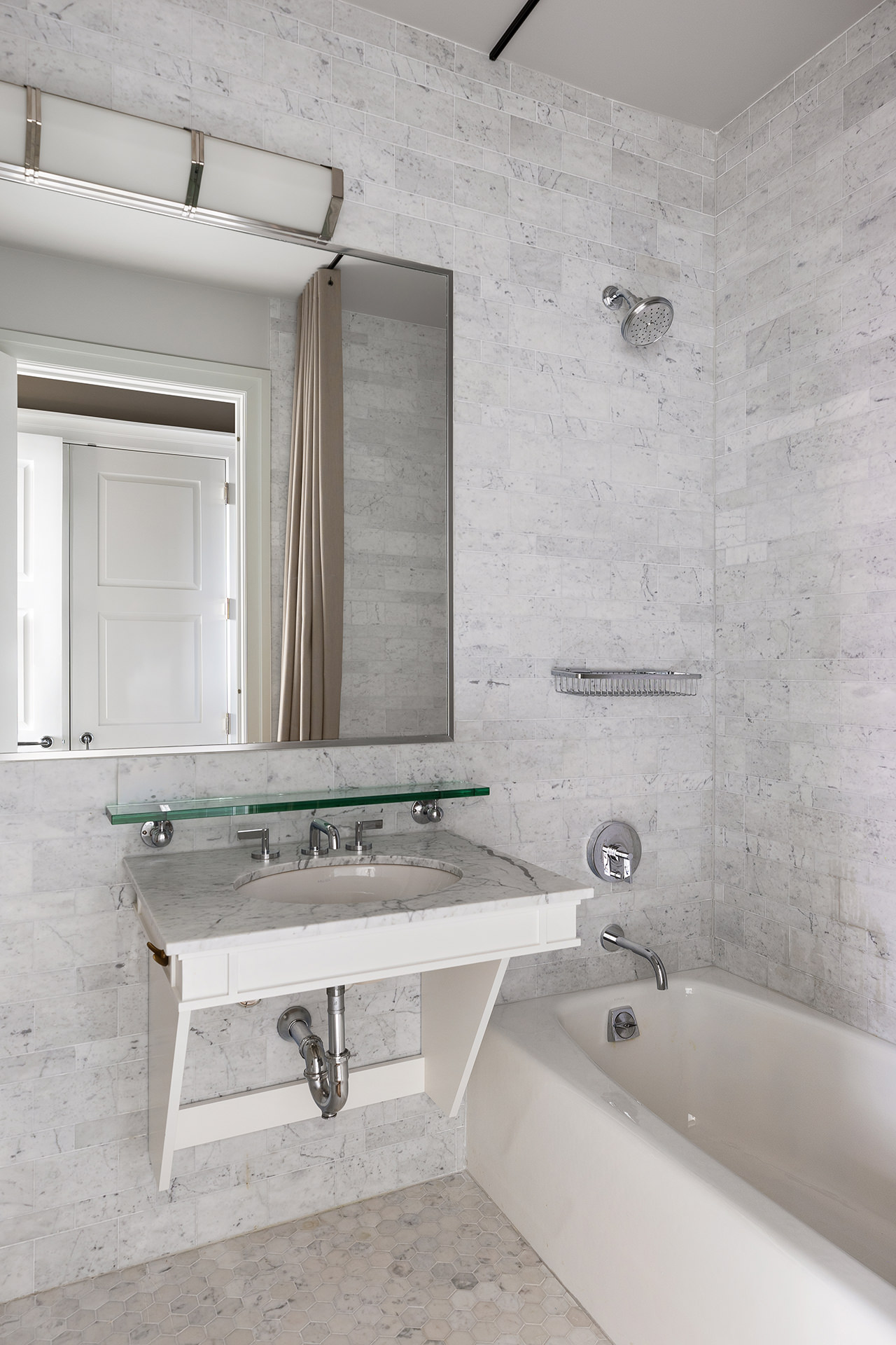 30 Park Place, Unit 59A Manhattan, NY 10007 - Photo 14 of 23 a bathroom with a sink and a bathtub