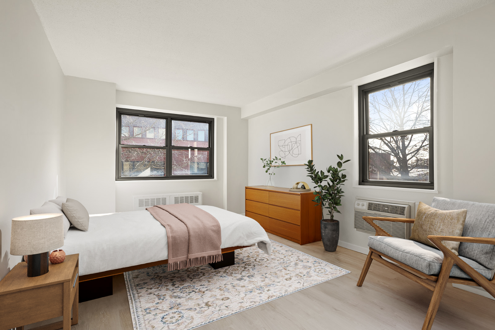 39-60 54th Street, Unit 4R Queens, NY 11377 - Photo 4 of 14 a bedroom with a large bed and a window