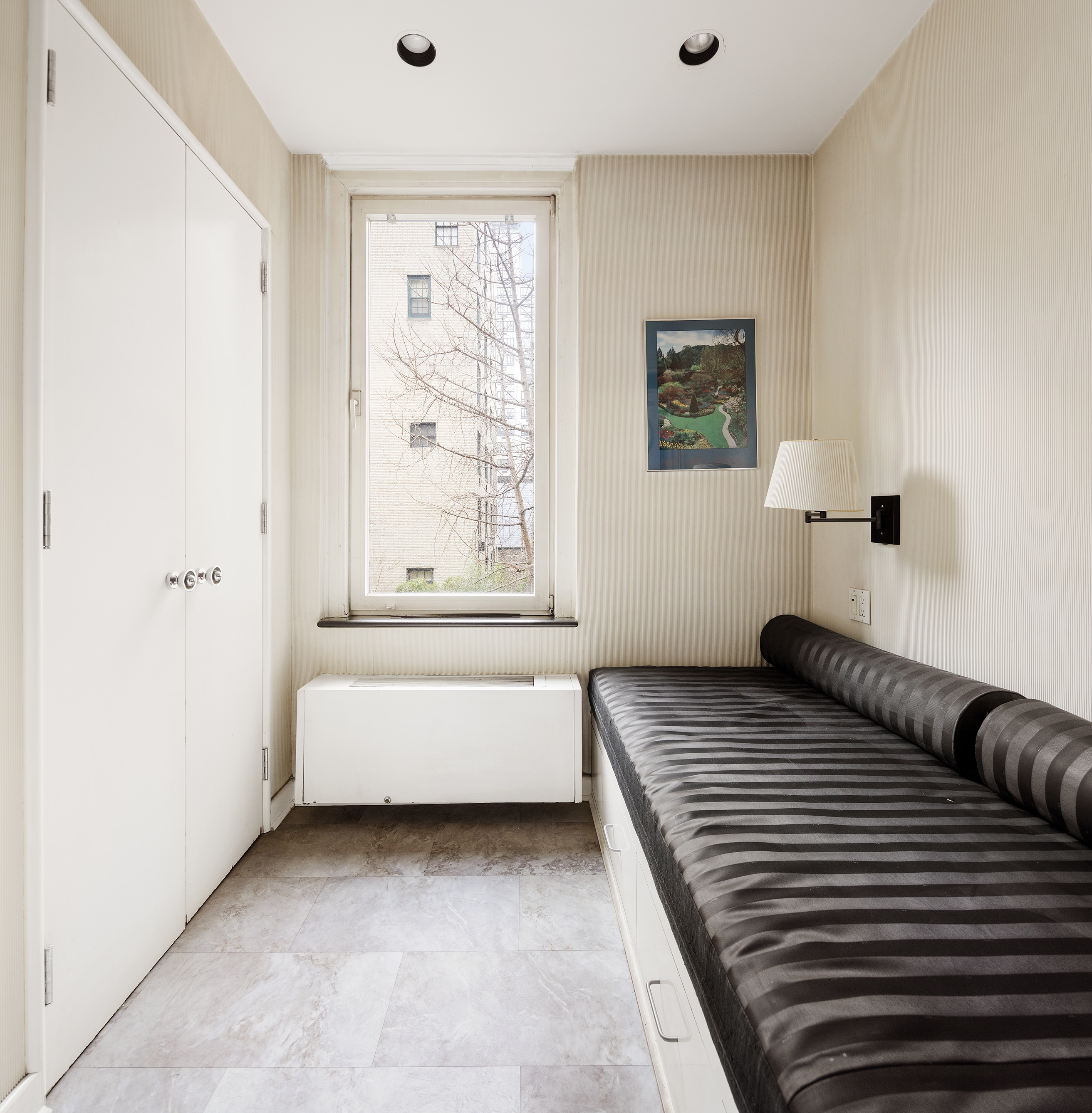 130 East 75th Street, Unit 4D Manhattan, NY 10021 - Photo 14 of 19 a bedroom with a bed and a window