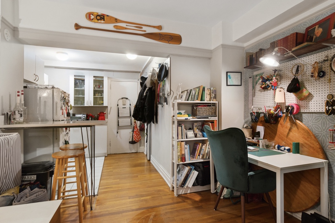 235 West 102nd Street, Unit 8A Manhattan, NY 10025 - Photo 3 of 5 a view of a workspace with furniture and wooden floor
