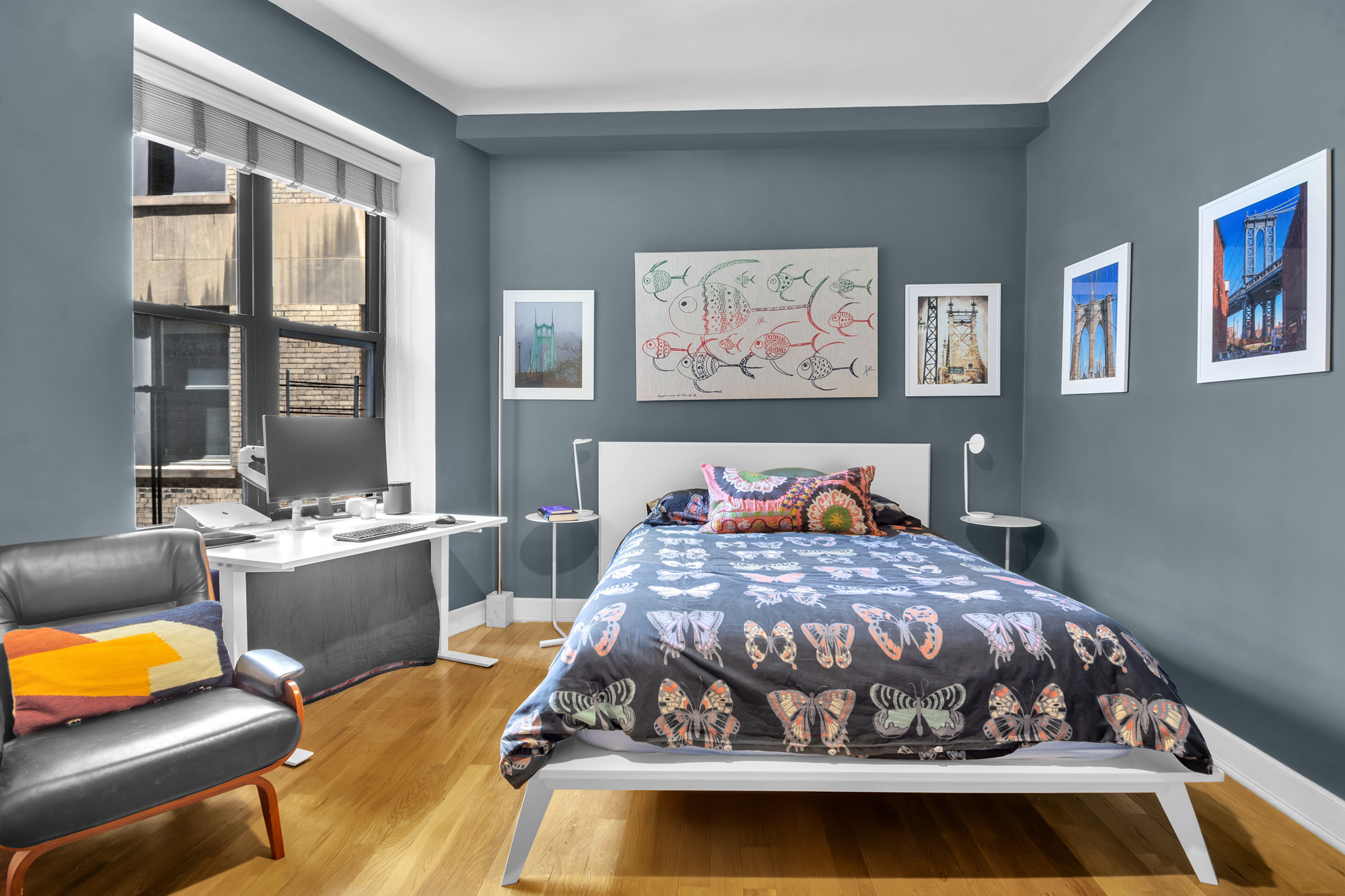 790 Riverside Drive, Unit 2LX Manhattan, NY 10032 - Photo 6 of 10 a bedroom with a bed and glass window