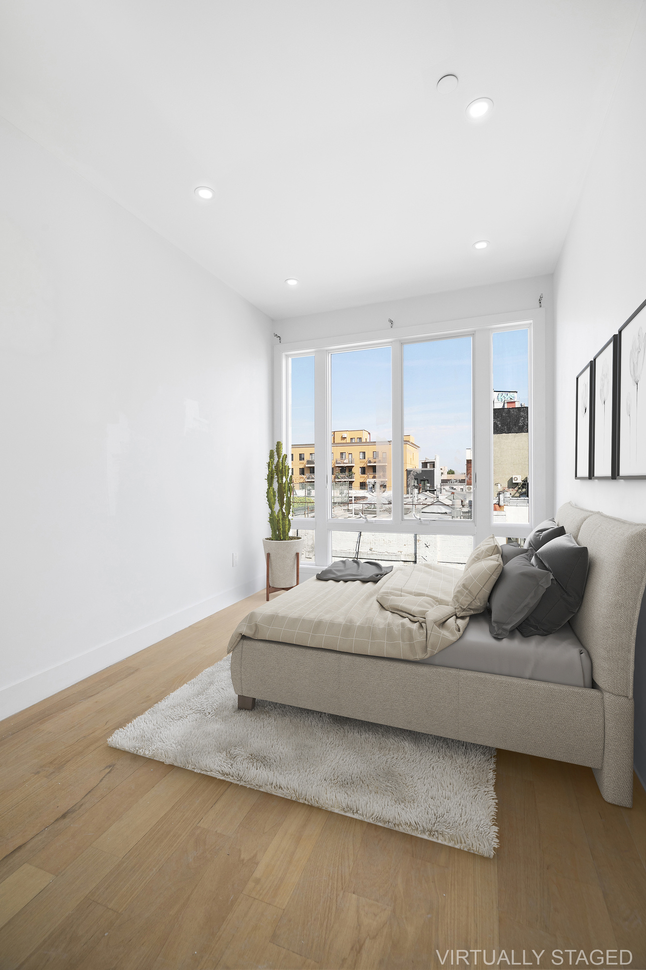483 Hart Street, Unit 2 Brooklyn, NY 11221 - Photo 11 of 17 a living room with furniture kitchen and a refrigerator
