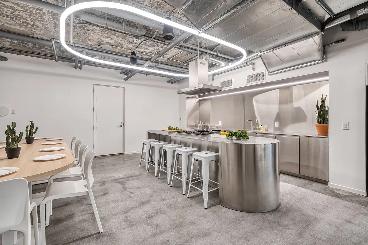 158 East 126th Street, Unit 730 Manhattan, NY 10035 - Photo 7 of 18 a view of a dining room with chairs