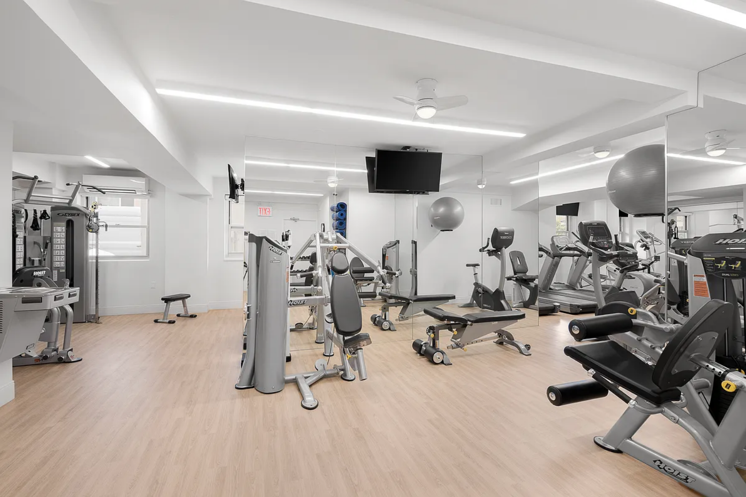 45 Sutton Place South, Unit PHI Manhattan, NY 10022 - Photo 17 of 20 a view of a room with gym equipment