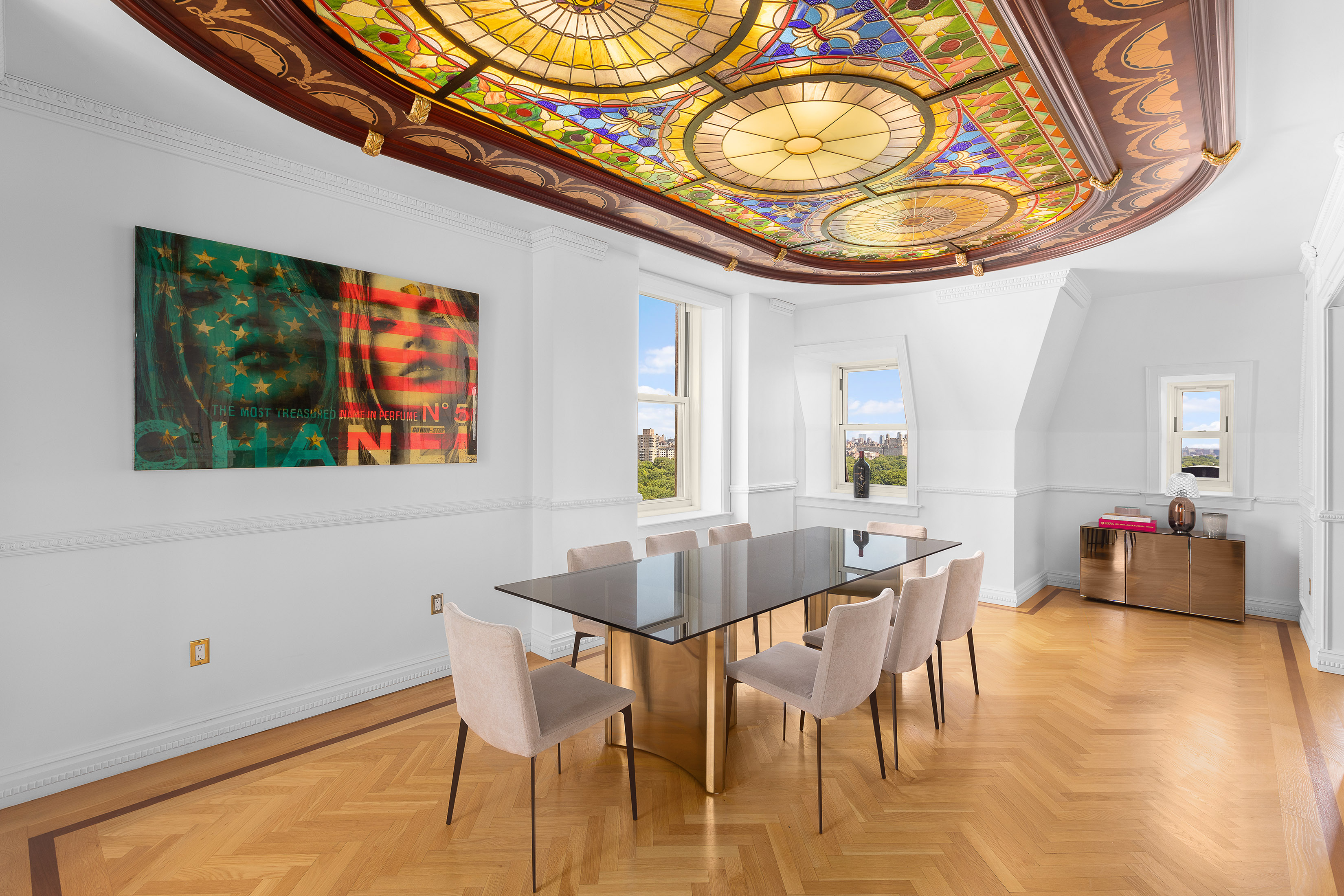 1 Central Park South, Unit 1801 Manhattan, NY 10019 - Photo 7 of 25 a dining room with furniture and wooden floor