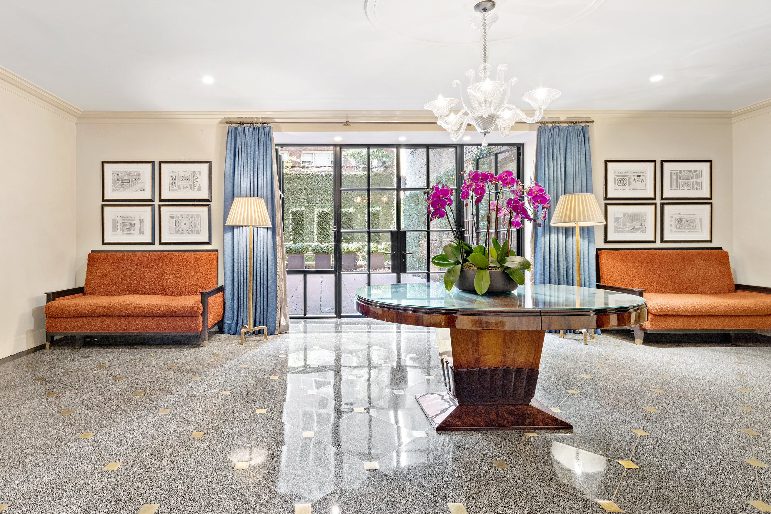 320 East 72nd Street, Unit PHB Manhattan, NY 10021 - Photo 24 of 26 a living room with furniture and a chandelier