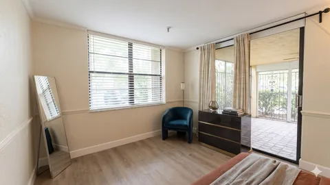 a room with furniture and a window