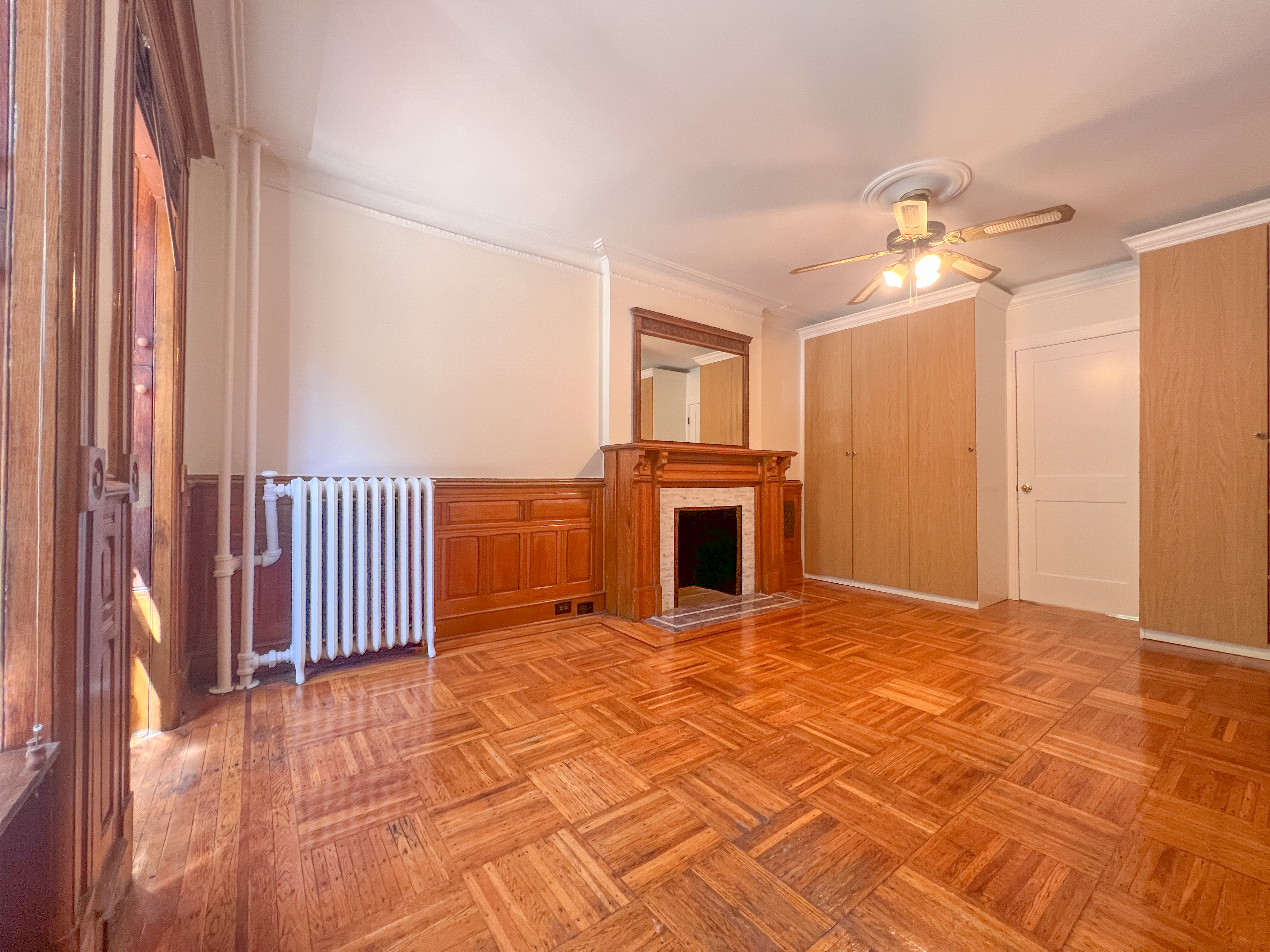 651 10th Street, Unit 1 Brooklyn, NY 11215 - Photo 2 of 15 a view of a livingroom with a staircase