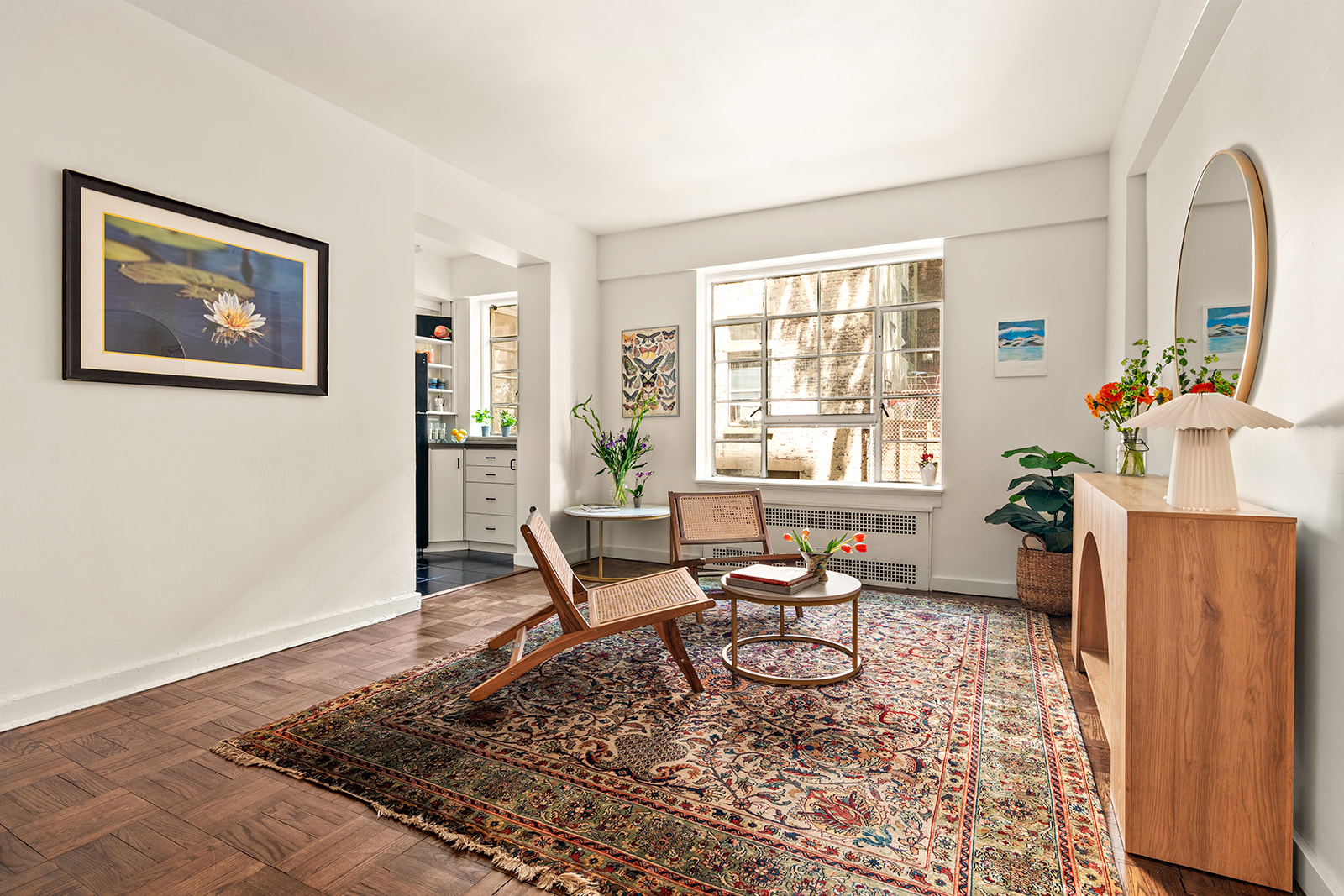 57 Montague Street, Unit 2G Brooklyn, NY 11201 - Photo 2 of 8 a living room with furniture and a window