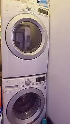 138 Edgecombe Avenue, Unit 3A Manhattan, NY 10030 - Photo 6 of 10 a utility room with dryer and washer