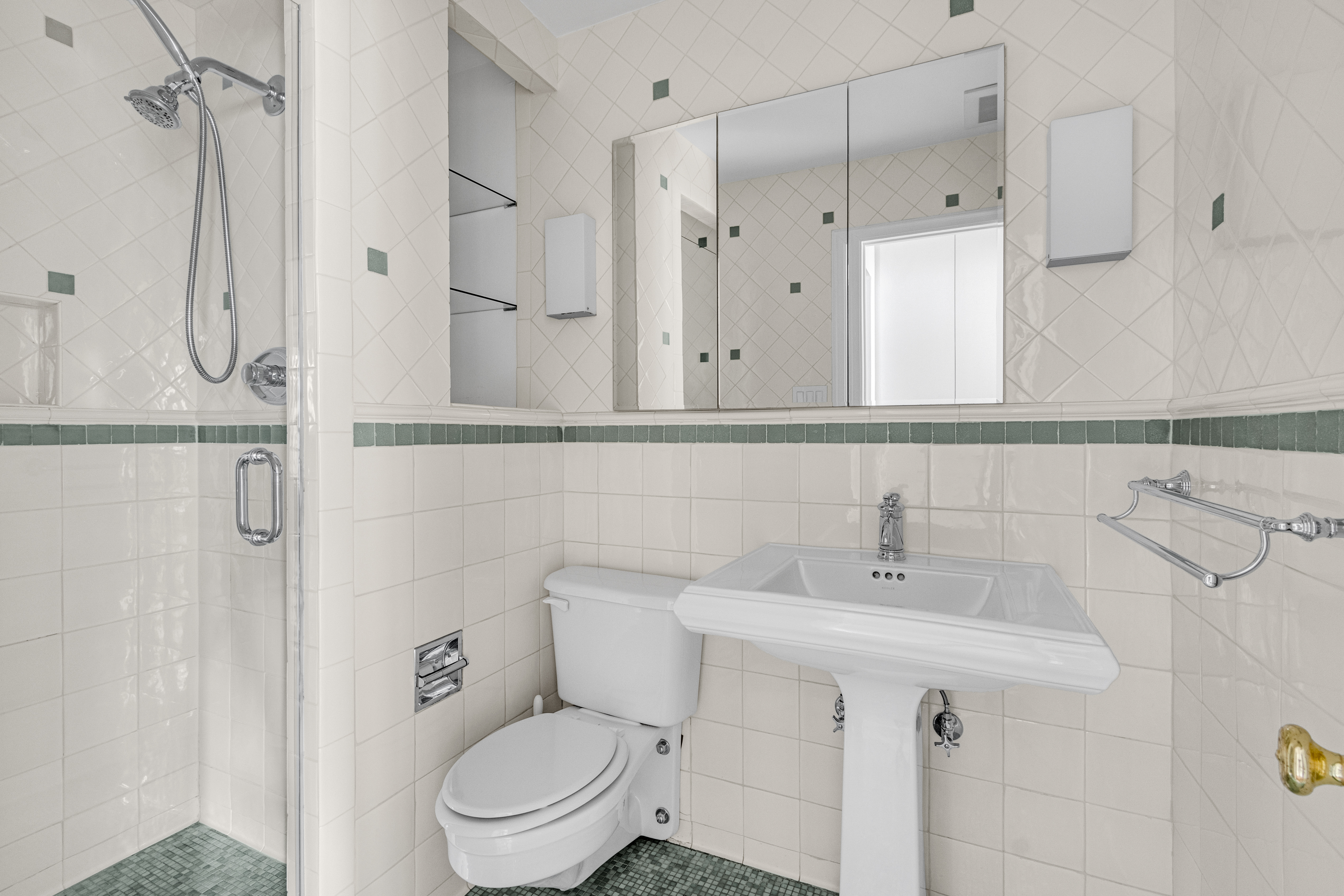 305 West 98th Street, Unit 7CS Manhattan, NY 10025 - Photo 11 of 18 a bathroom with a sink a toilet and shower